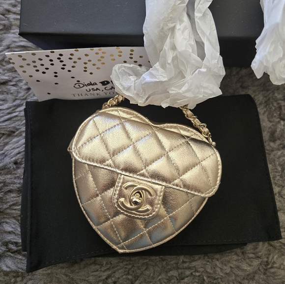 CHANEL Handbags - CHANEL Heart Clutch on Chain.
